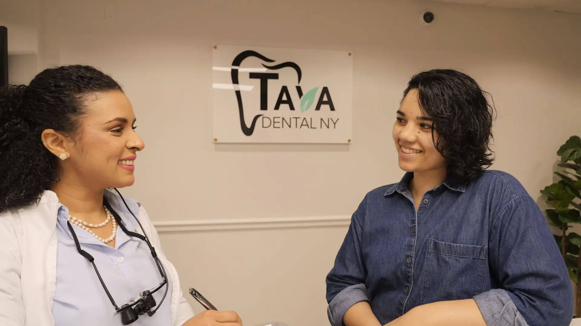 Tava Dental NY patient smiling after treatment